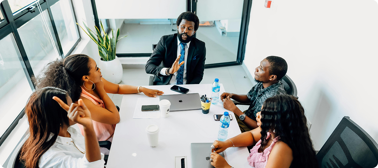 Strategic advisory meeting with diverse team of professionals